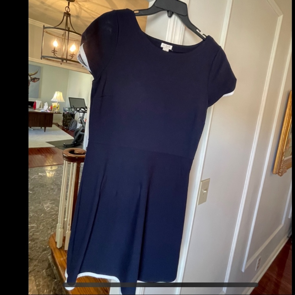 Blue Dress with white details.